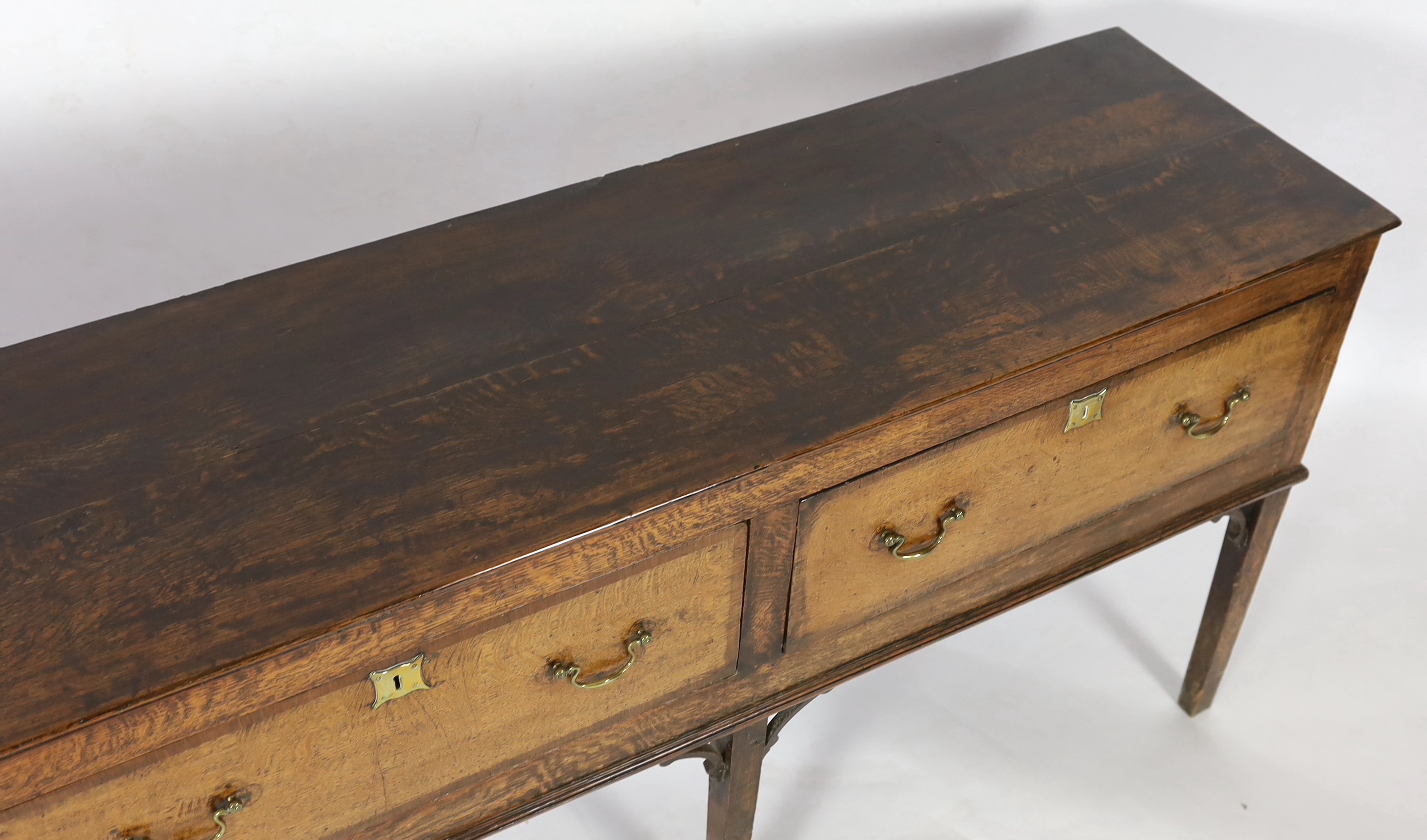 A mid 18th century oak dresser base